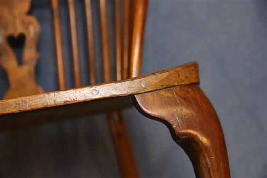 An early 19th century yew, ash and elm Windsor chair, W.2ft D.1ft 9in. H.3ft 5in.